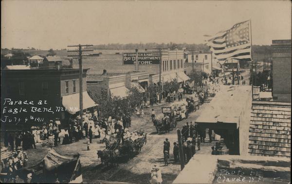 Parade on Main Street in Eagle Bend MN Minnesota Claude M.F.