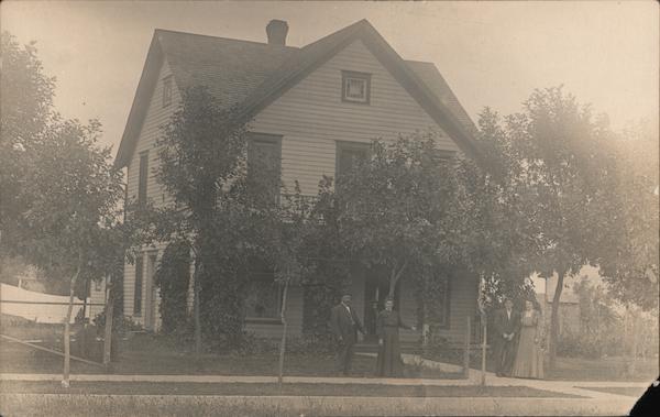 Four People In Front of House Hokah Minnesota