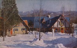 Two of Santa's workshops with the Adirondack Mountains in the background. Postcard