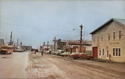 Main Street with City Hall Nome, AK Mike Roberts Postcard Postcard Postcard