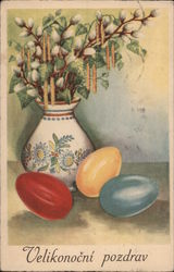 Easter eggs next to a Vase with plants Postcard