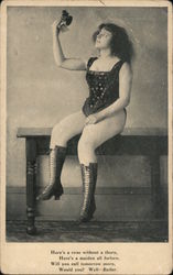 A Woman in Lingerie Holding a Rose Postcard