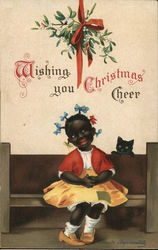 Whishing You Christmas Cheer - a girl and her cat sit on a bench under mistletoe Children Ellen Clapsaddle Postcard Postcard Postcard