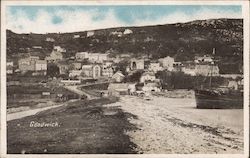 View of the town from the beach Postcard