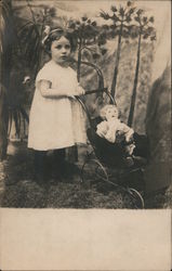 Young Girl with Doll in Baby Stroller Postcard