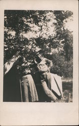 Man Shooting Rifle by Tent Postcard