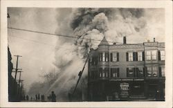 1925 Littleton Hardware Company on Fire Postcard