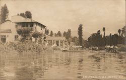 Gondola like boats on a river in Xochimilco, Mexico Postcard
