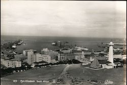 View of Lighthouse and Harbor Postcard