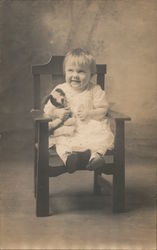 Studio Photo: Child Sitting in Chair Holding Stuffed Animal Postcard