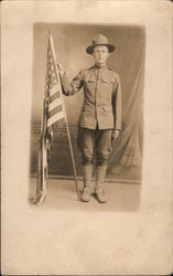 Studio Photo: WWI Soldier w/American Flag Postcard