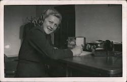 a woman smiling while writing at a desk Czechoslovakia Women Postcard Postcard Postcard