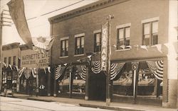 Garage, Businesses Decorated with Patriotic Flags Postcard