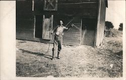 Cowboy Swinging Lasso in Front of Barn Postcard