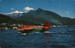 Ellis Air Lines, Amphibian Plane taking off in Tongass Narrows with Ketchikan, AK in the background Alaska Postcard Postcard Postcard