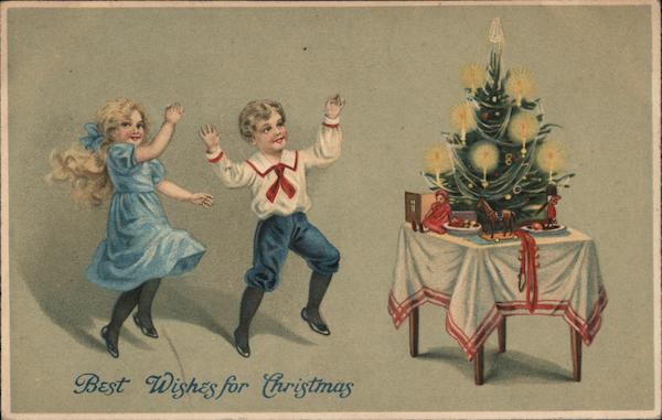 Children Dancing in Front of Christmas Tree