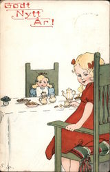 Godt Nytt Ar - Girl Playing With Her Dool Postcard