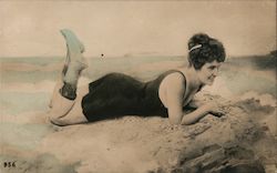 A Girl Laying on the Beach Postcard