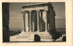 Greek ruins with 4 Ionic columns, steps, and carved frieze Postcard