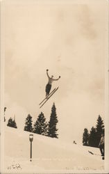 A Skier Jumps over Hillside in Midair with Arms Raised, "Daredevil Johnie" Postcard