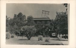 Hotel Stockton, Three story stone building with arrow pointing to it Postcard