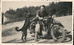 Man on Triumph Motorcycle With Dog Postcard
