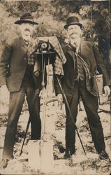 Two Men Standing with Tripod Camera Postcard