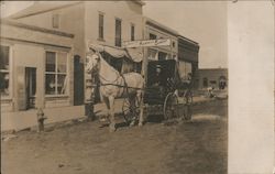 Man in Carriage at G. J. Kemnitz Harness Shop Postcard
