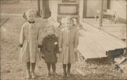 Three Girls Standing in Front of Porch Postcard