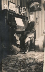 Man sitting at piano Pianos Postcard Postcard Postcard