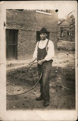 Emelio Marchio Watering Garden Missouri Men Postcard Postcard Postcard