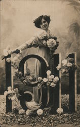 Woman Standing Behind 1911 Numbers and Flowers Postcard