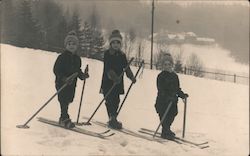 Three Kids on Skis Postcard