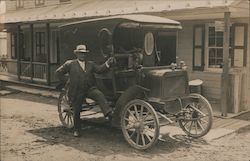 Man leaning against an early Delivery Truck, Tailor? York, PA Postcard Postcard Postcard