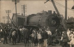 Image Of A Crowd Gathering Around A Steam-Engine Train With Powerlines Postcard