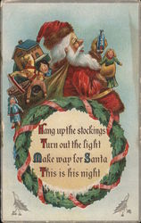 Santa with Christmas wreath and poem. Postcard