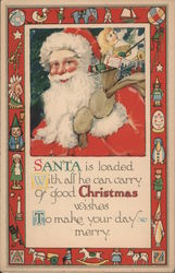 Santa is loaded with all he can carry Postcard
