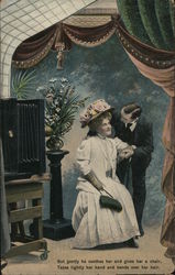 Man Holding Woman's Arm in Photography Studio Postcard