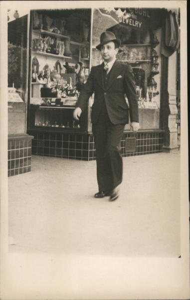 Man Walking Past Bohl's Jewelry Store Hot Springs, AR Postcard