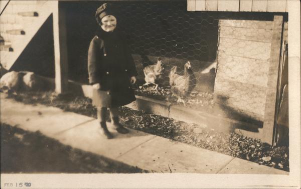 Girl with her chickens