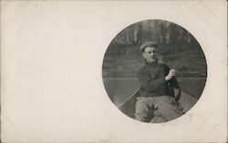 Tondo Photograph of Man Rowing Canoe Postcard