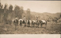Horses Standing Side by Side with People on Some of Them Postcard