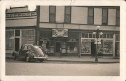 Rexall Drugs, Nash Ambassador Sedan Rout 62 & 28 Postcard