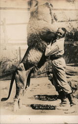 Mr. Gay and "Pluto" - Gay's Lion Farm Postcard