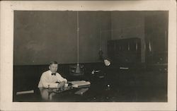 Man and Woman at Desks in Office Lock Haven, PA Postcard Postcard Postcard