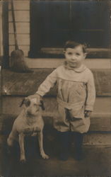 Boy with dog on steps Postcard