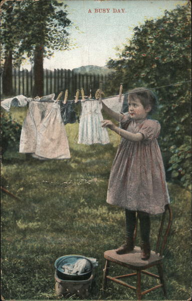 Girl Hanging Doll Clothes - A Busy Wash Day Girls