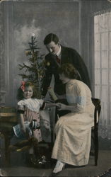 Family Around Decorated Tree on Table Postcard