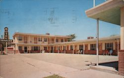 Motel Travelier - 1 Block North of Highways 20-26-87 - Convenient to Downtown Casper Postcard
