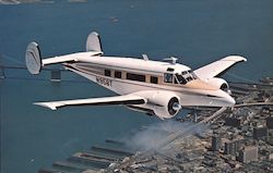 Beechcraft Super H18 over San Francisco California Postcard Postcard Postcard